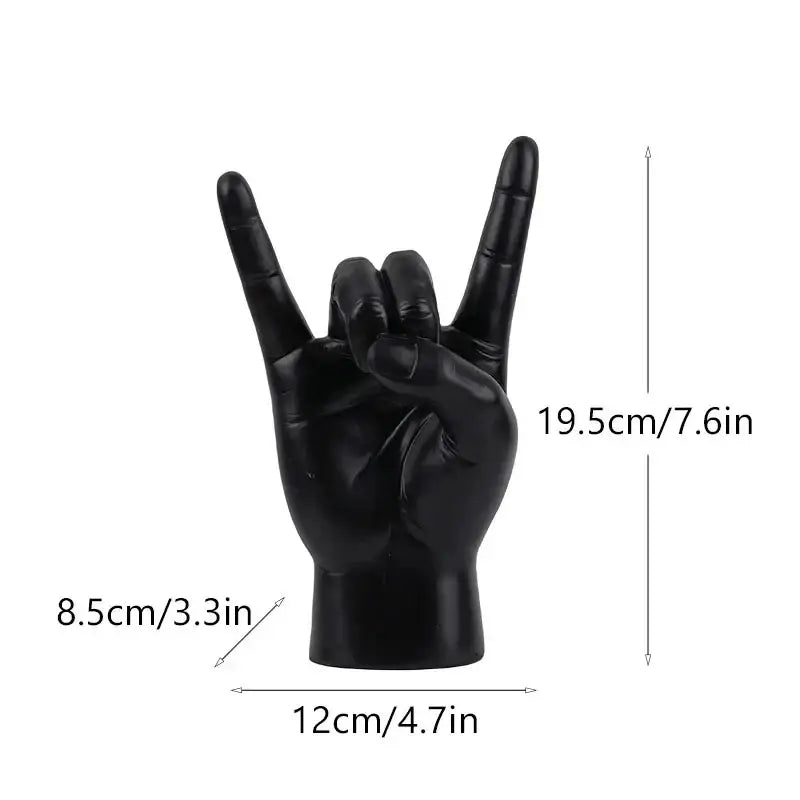Chic black glossy rock hand gesture sculpture living room decor