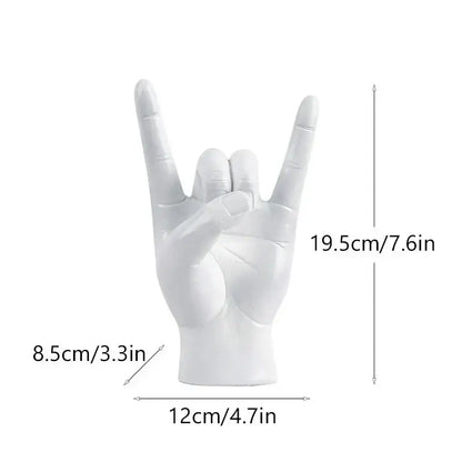 Chic black glossy rock hand gesture sculpture living room decor