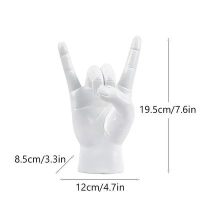 Chic black glossy rock hand gesture sculpture living room decor