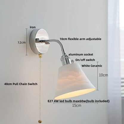 Chrome adjustable arm wall lamp with ribbed glass shade – bedroom