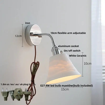 Chrome adjustable arm wall lamp with ribbed glass shade – bedroom