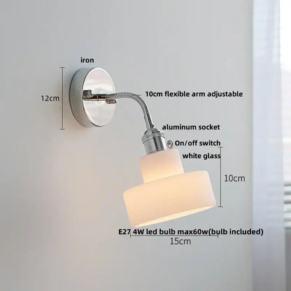 Chrome adjustable arm wall lamp with ribbed glass shade – bedroom