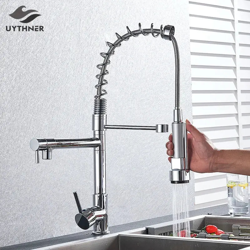 Chrome kitchen faucet with pull down spring hose