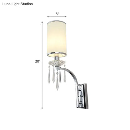 Chrome wall mounted sconce with crystal ribbed shade for living room