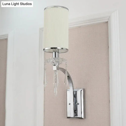 Chrome wall mounted sconce with crystal ribbed shade for living room