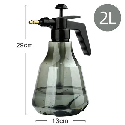 Clear and teal hand trigger watering sprayer garden planting accessory