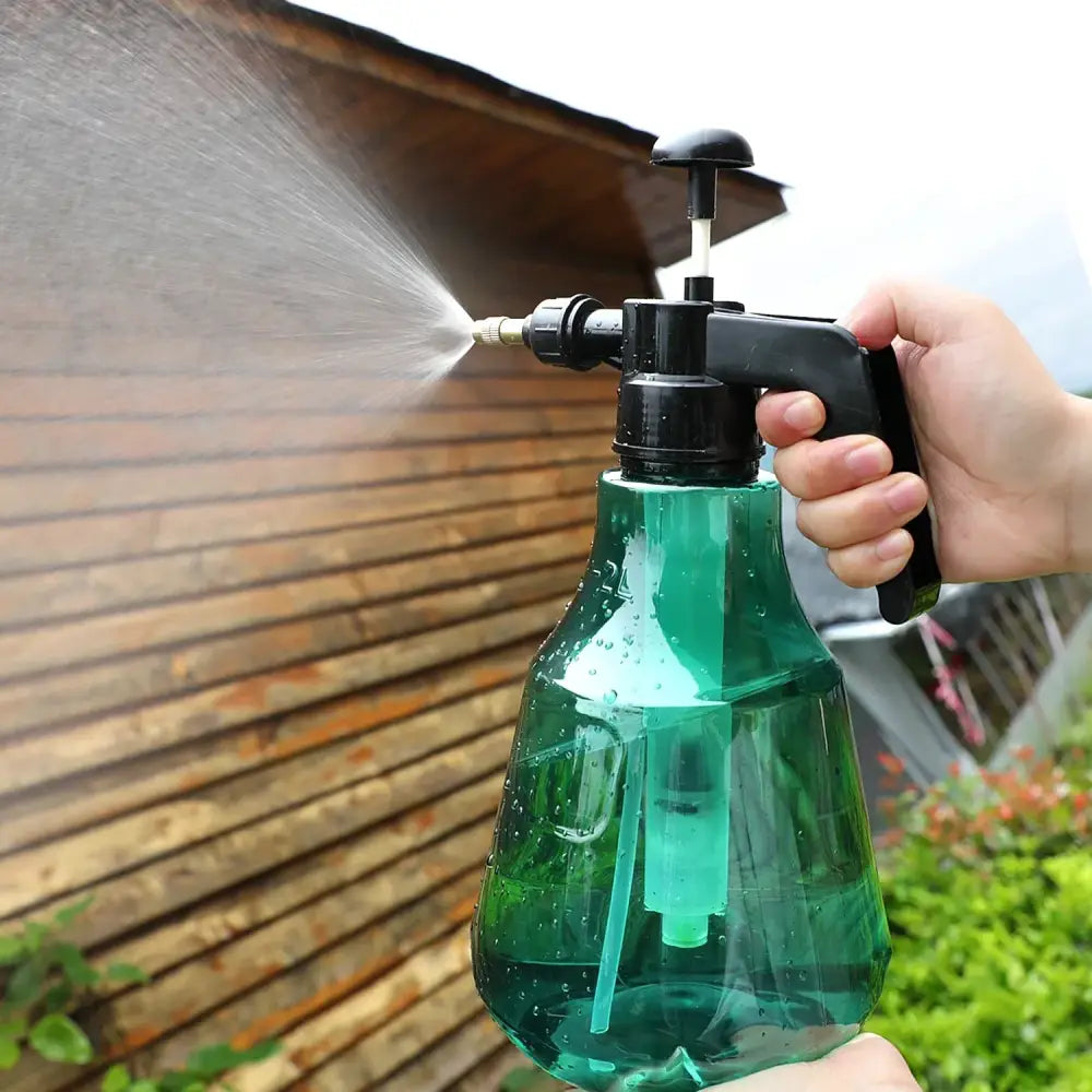 Clear and teal hand trigger watering sprayer garden planting accessory