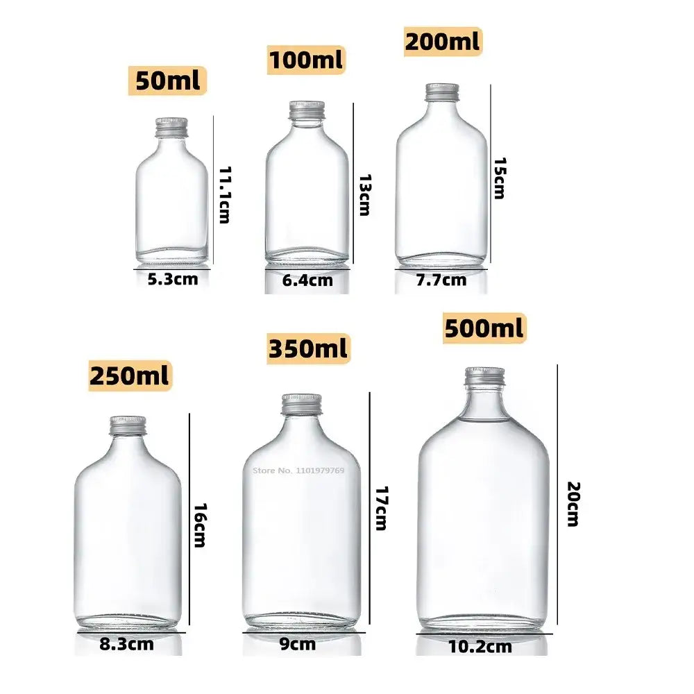 Clear glass beverage bottles with silver caps – kitchen juicing set