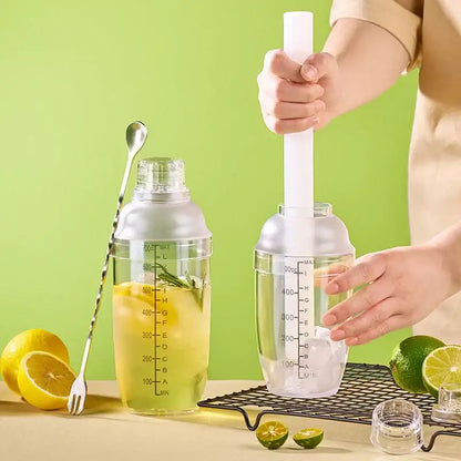 Clear glass cocktail shaker with silver lid for kitchen and barware