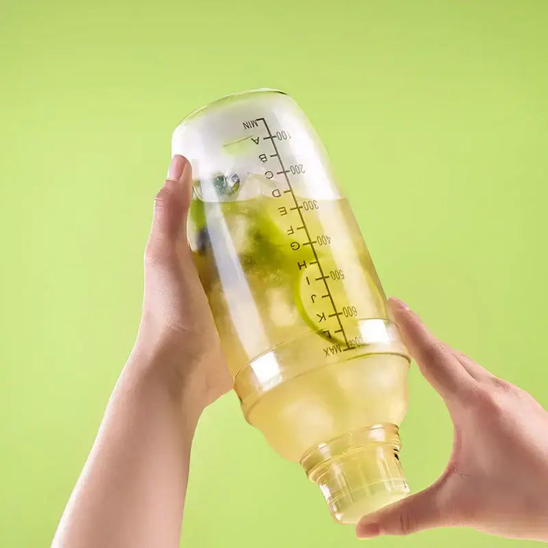 Clear glass cocktail shaker with silver lid for kitchen and barware