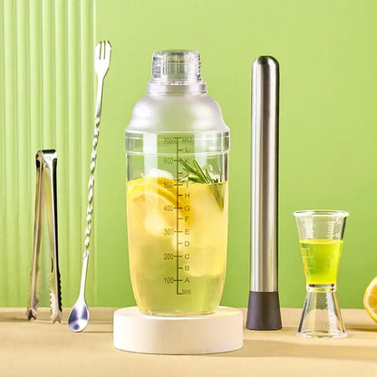 Clear glass cocktail shaker with silver lid for kitchen and barware