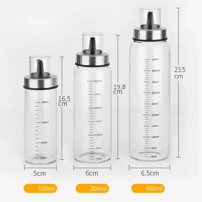 Clear glass condiment bottle set with measurements for kitchen