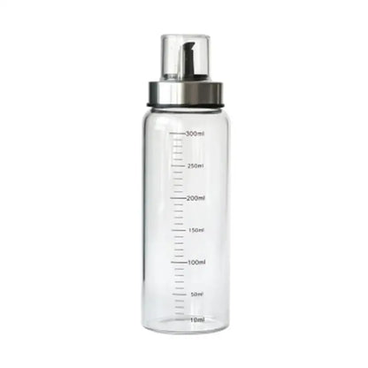 Clear glass condiment bottle set with measurements for kitchen
