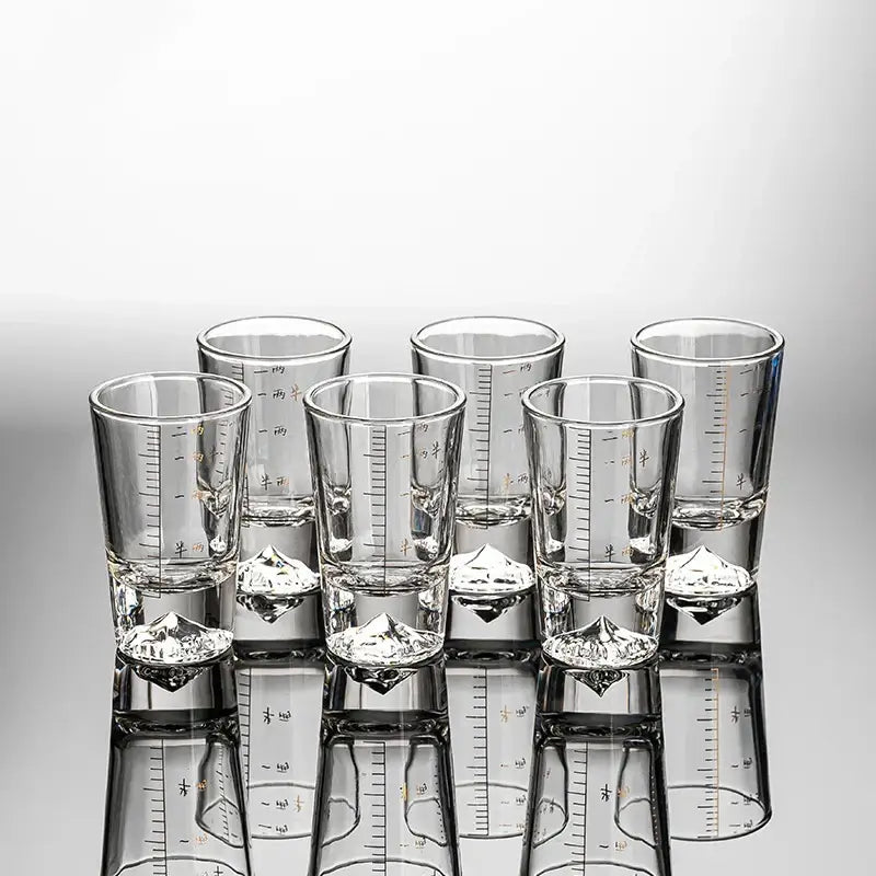 Clear glass liquor cup set with measurement markings dining room glass