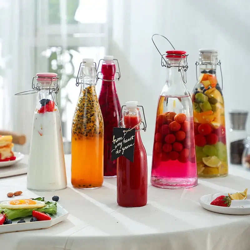 Clear glass storage bottle with swing top lid for kitchen storage