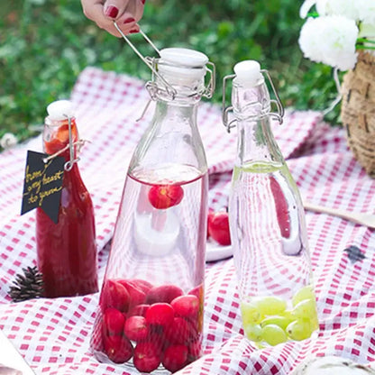 Clear glass storage bottle with swing top lid for kitchen storage
