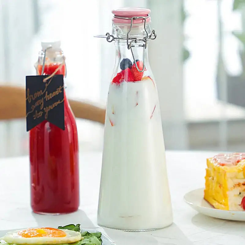 Clear glass storage bottle with swing top lid for kitchen storage