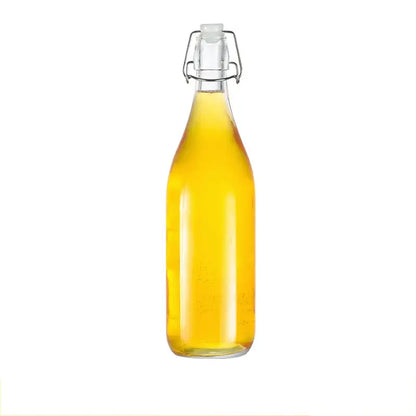 Clear glass storage bottle with swing top lid for kitchen storage