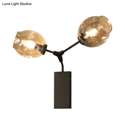 DecorBites™ Contemporary Black/Gold Wall Sconce with Oval Amber/Gold/Clear Glass Shade - Elegant Half-Light Wall Mount