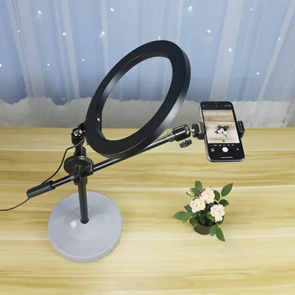 Contemporary black round shaped metal vanity light bedroom phone stand