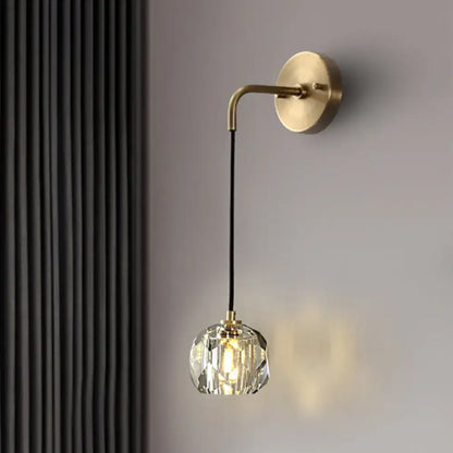 Contemporary brass and crystal globe wall light bedroom sconce