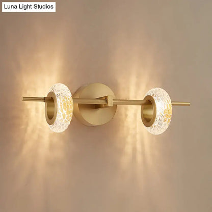 Contemporary brass double oval wall light fixture – bedroom led sconce