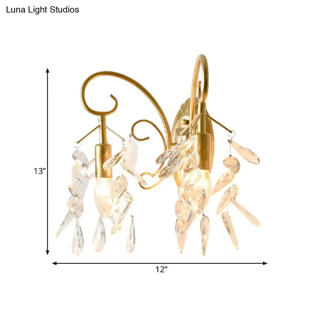 Contemporary brass teardrop crystal wall mount light for bedroom