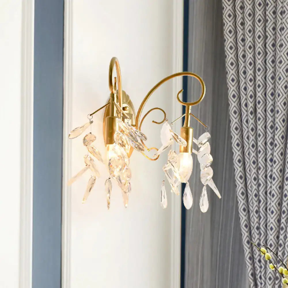 Contemporary brass teardrop crystal wall mount light for bedroom