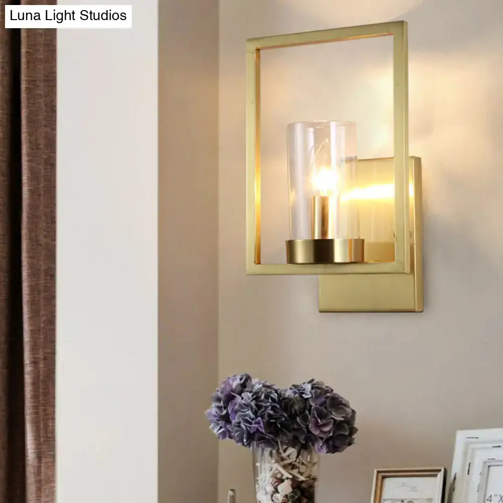 Contemporary brass wall light clear glass cylinder bedroom light fixture