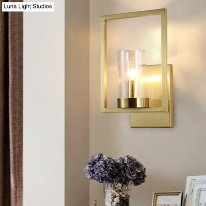 Contemporary brass wall light clear glass cylinder bedroom light fixture