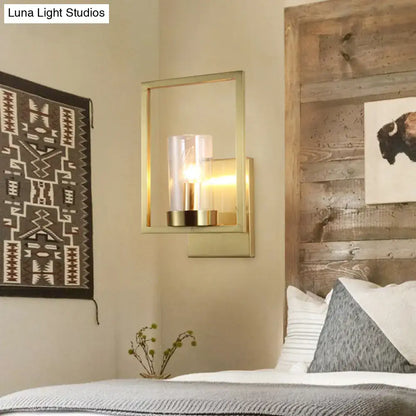 Contemporary brass wall light clear glass cylinder bedroom light fixture
