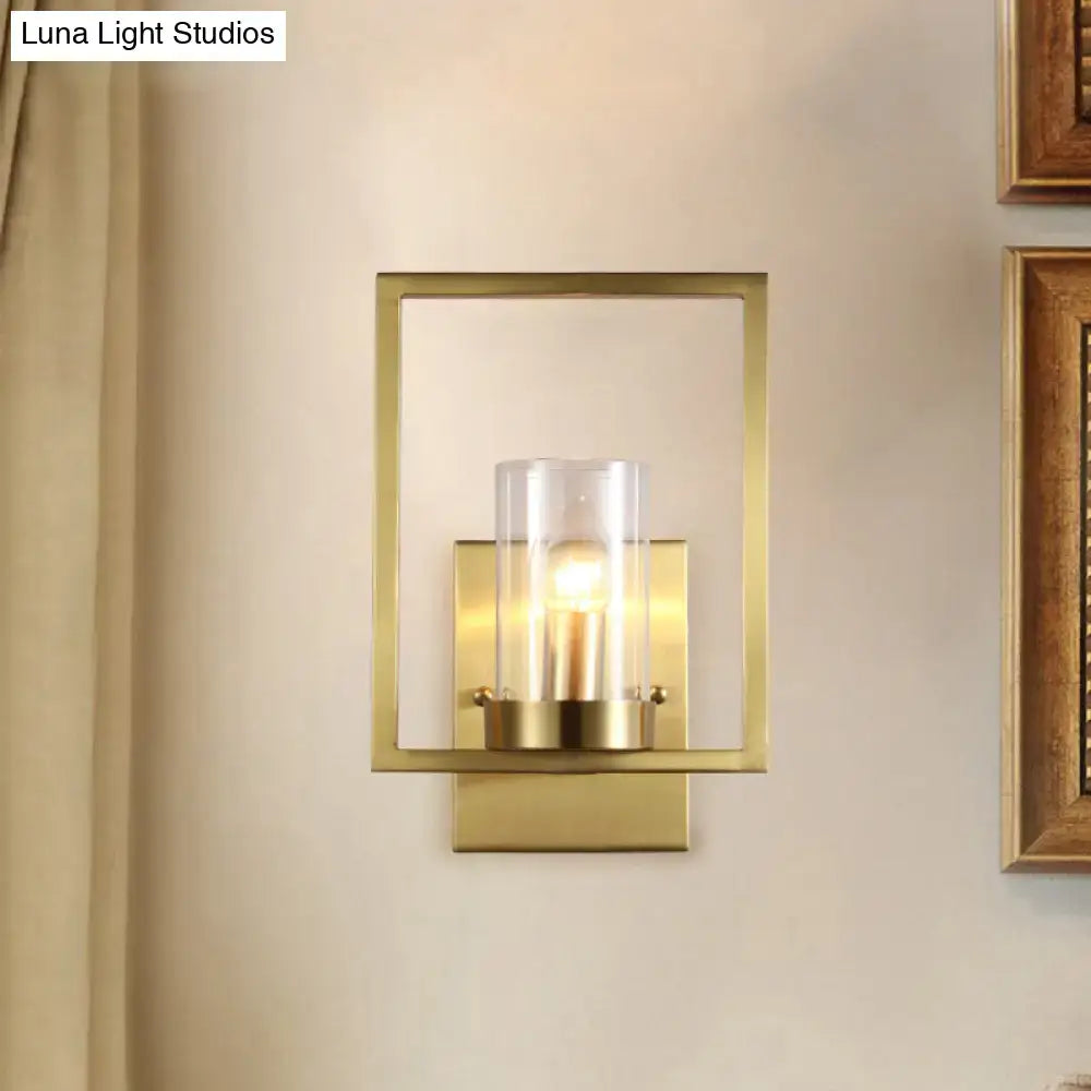 Contemporary brass wall light clear glass cylinder bedroom light fixture