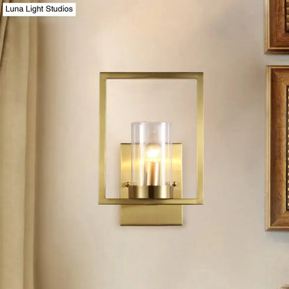 Contemporary brass wall light clear glass cylinder bedroom light fixture