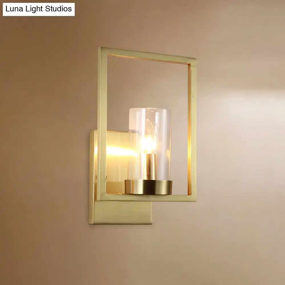 Contemporary brass wall light clear glass cylinder bedroom light fixture