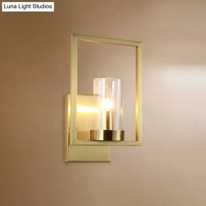Contemporary brass wall light clear glass cylinder bedroom light fixture