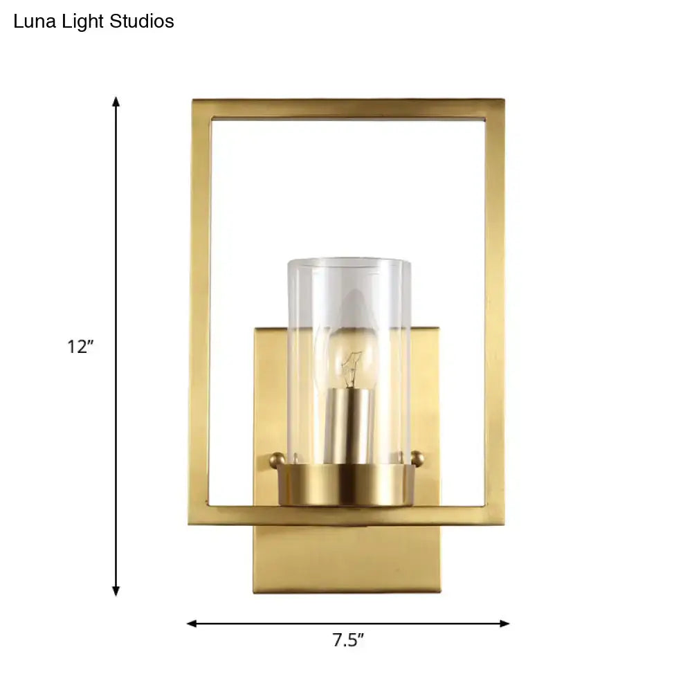 Contemporary brass wall light clear glass cylinder bedroom light fixture