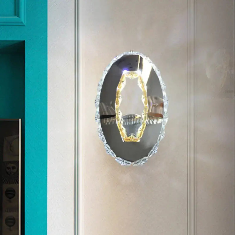 Contemporary chrome crystal oval light fixture warm white bedroom mirror