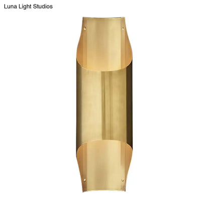 Contemporary curved brass wall lamp for living room