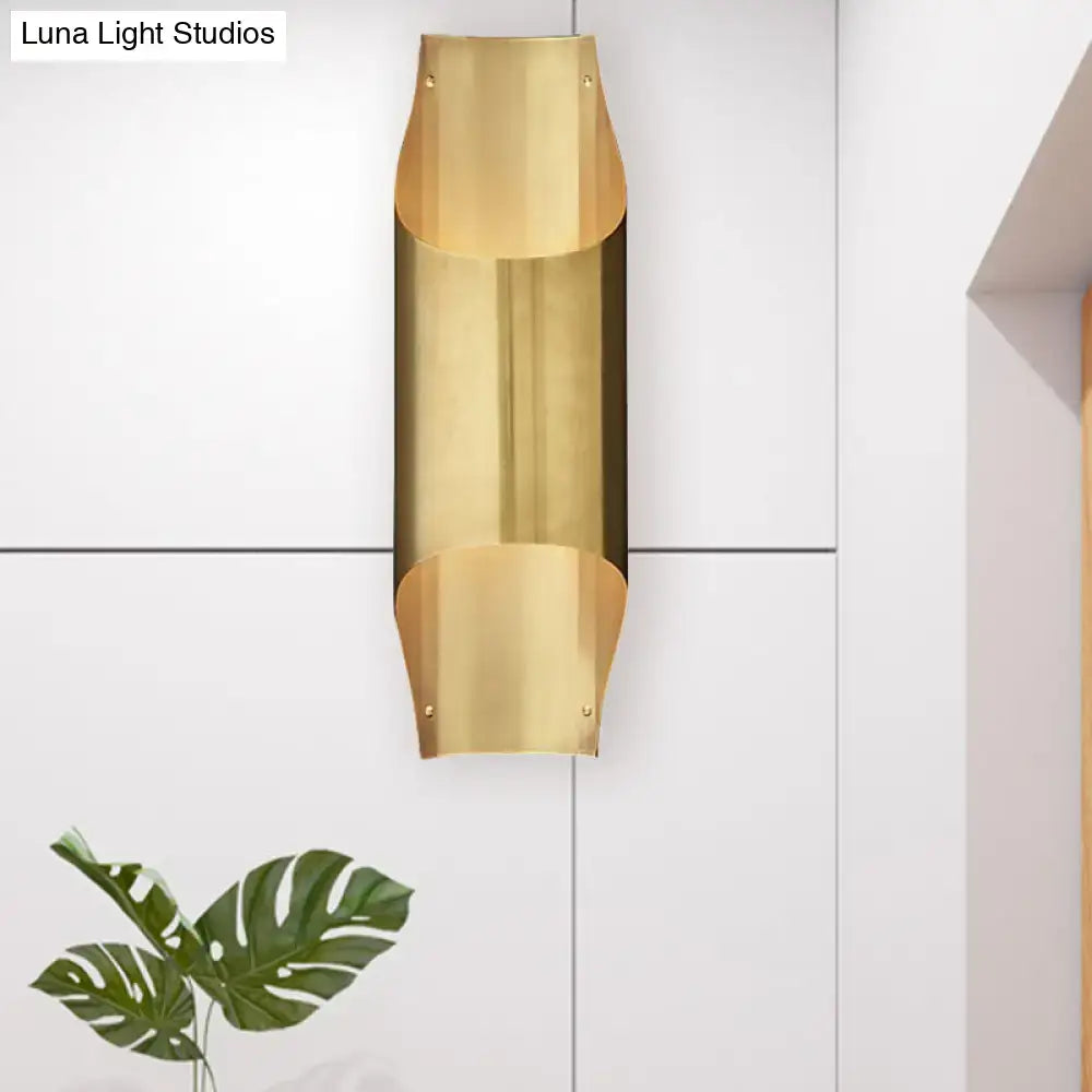 Contemporary curved brass wall lamp for living room