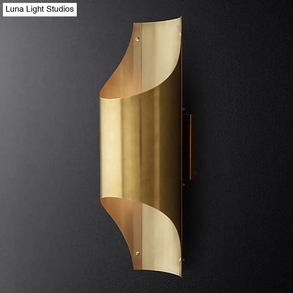 Contemporary curved brass wall lamp for living room