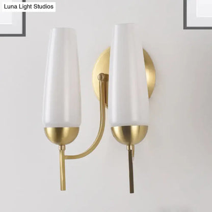 Contemporary gold and opal conical wall sconce bedroom light
