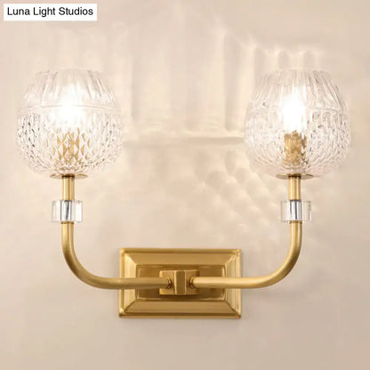 Contemporary gold dome foyer wall light with clear lattice glass