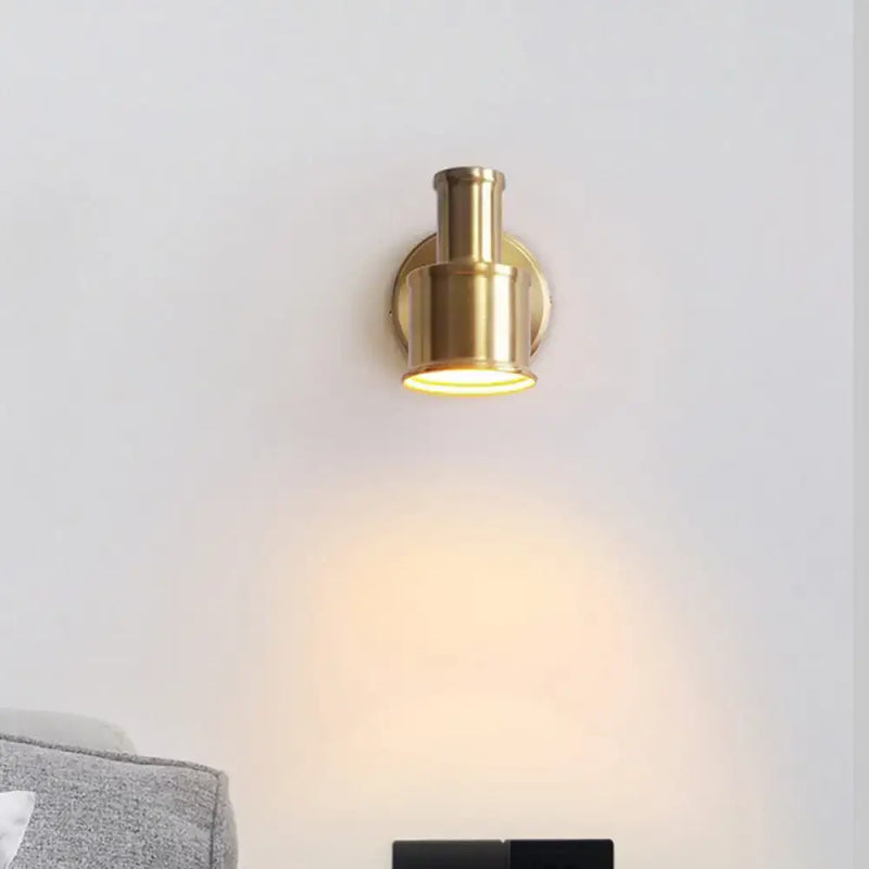 Contemporary gold metal cylinder wall sconce – bedroom spotlight