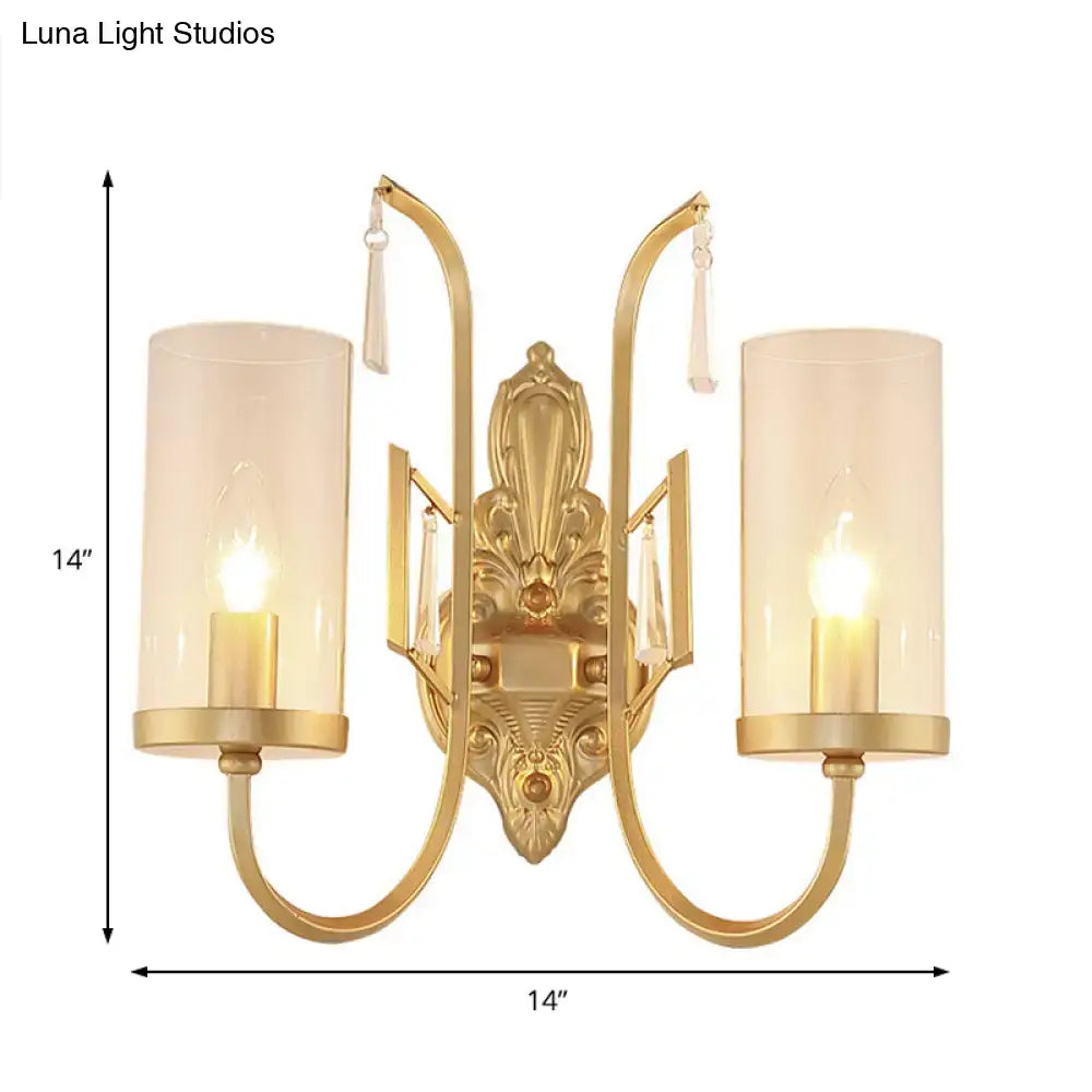 Contemporary gold wall light bedroom sconce with clear glass shade