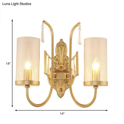 Contemporary gold wall light bedroom sconce with clear glass shade