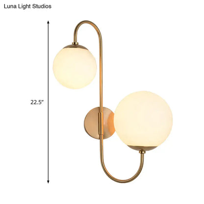 Contemporary gold wall sconce bedroom light with opal glass shade
