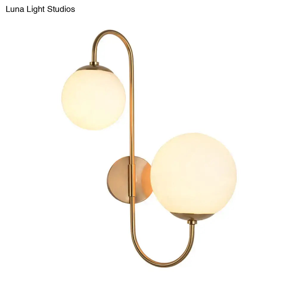 Contemporary gold wall sconce bedroom light with opal glass shade