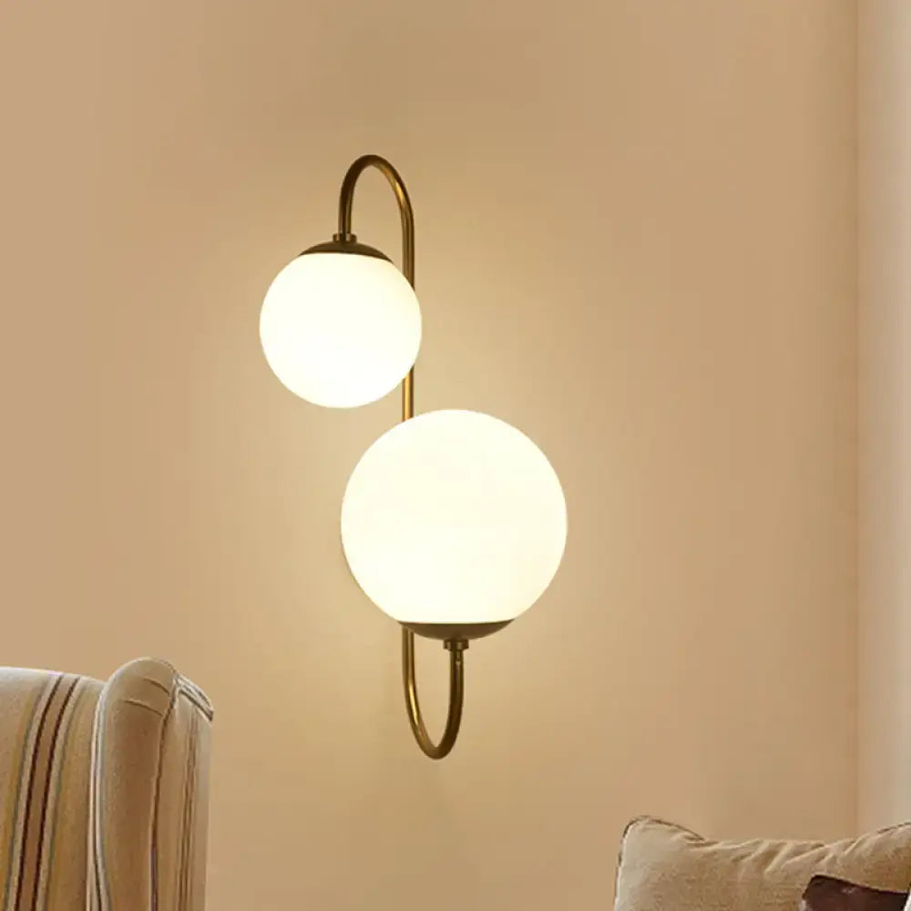 Contemporary gold wall sconce bedroom light with opal glass shade