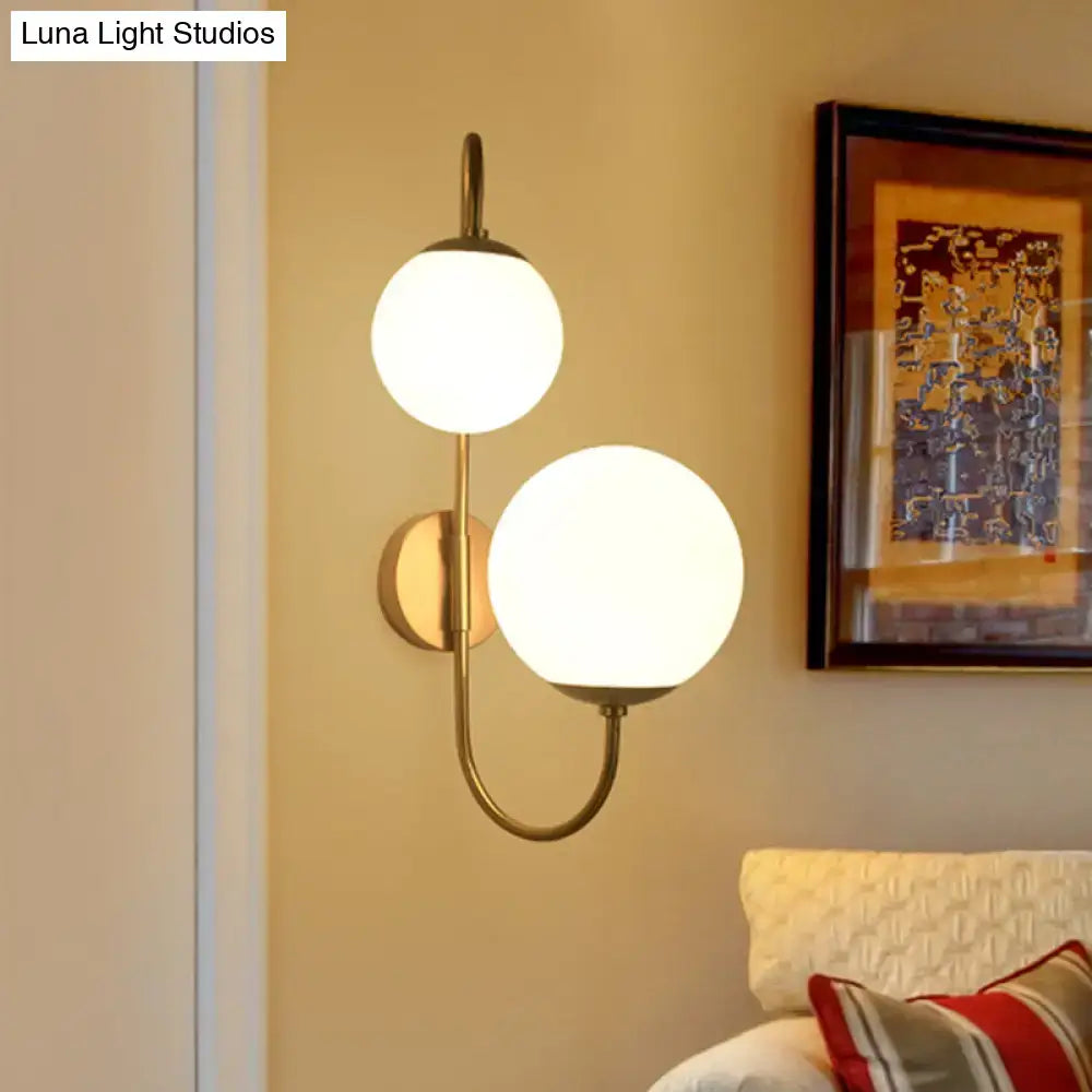 Contemporary gold wall sconce bedroom light with opal glass shade