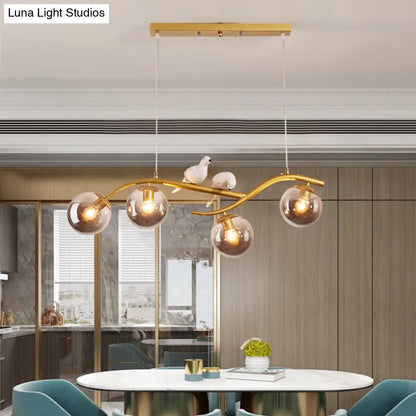 DecorBites™ Contemporary Metal Branch Hanging Lamp Island Pendant - 4-Light Black/Gold with Bird Deco and Smoke Grey/Cognac Glass Shade